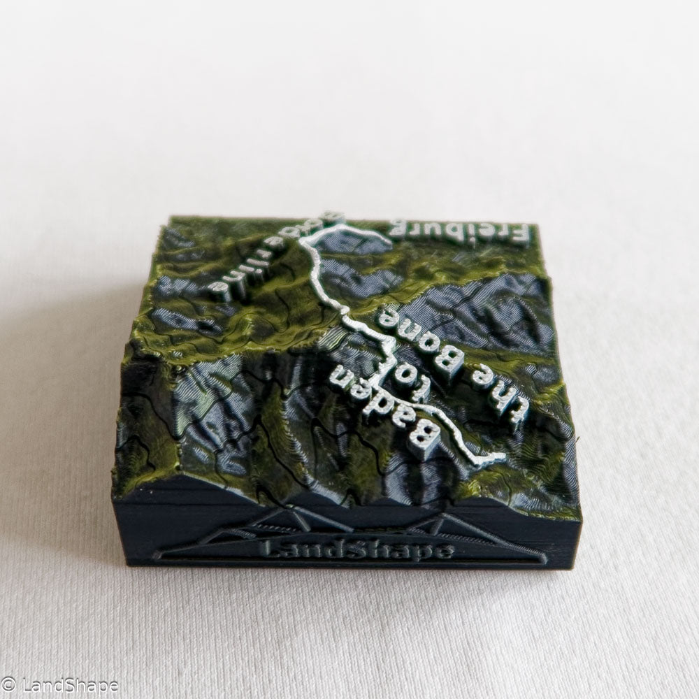 Produktfoto des Borderline-Trail Dekomagneten in Moss Metallic von hinten