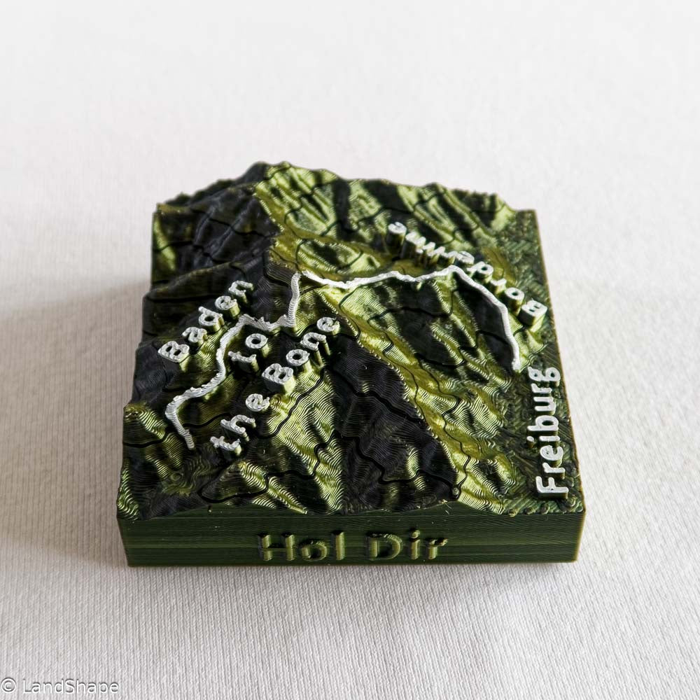 Produktfoto des Borderline-Trail Dekomagneten in Moss Metallic von links