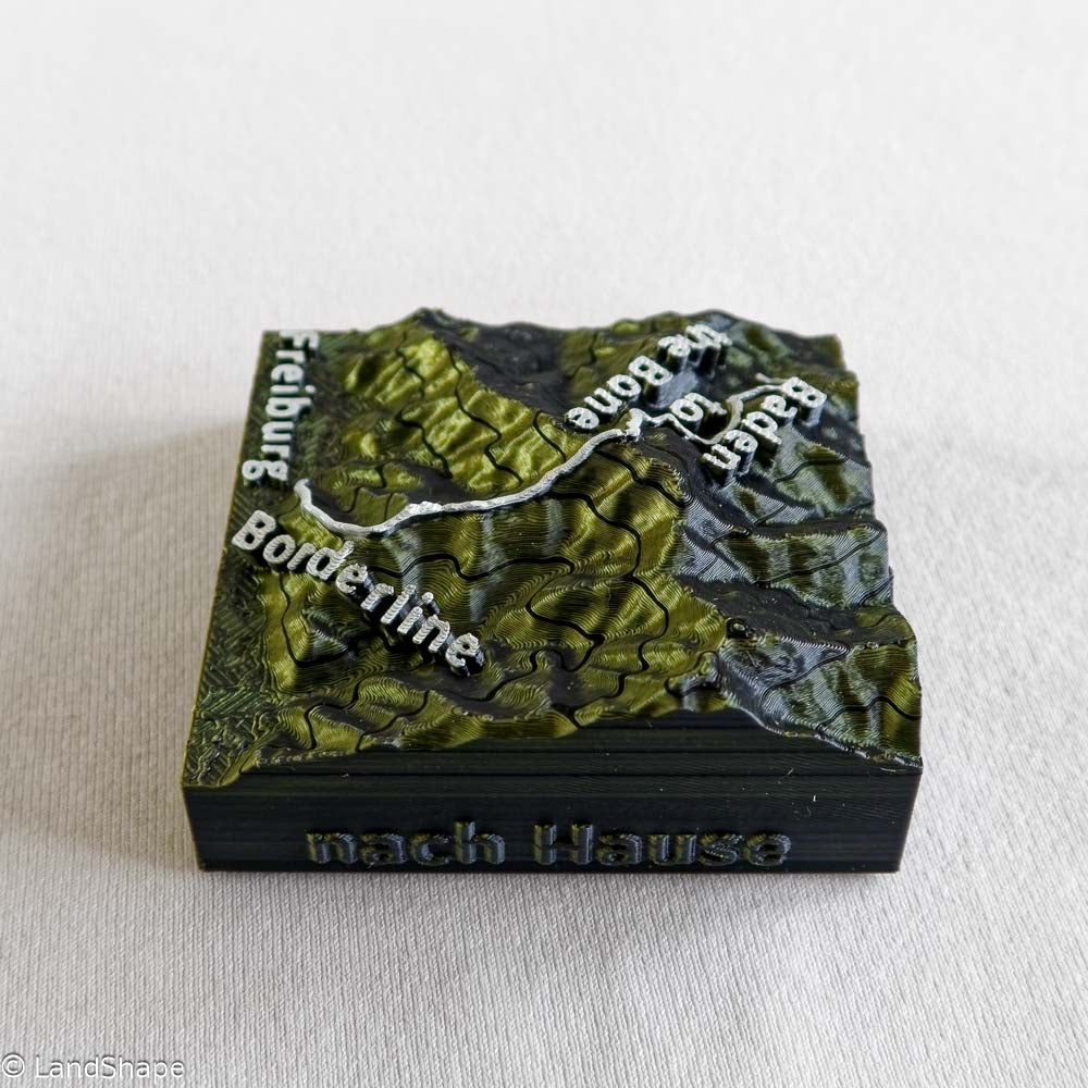 Produktfoto des Borderline-Trail Dekomagneten in Moss Metallic von rechts