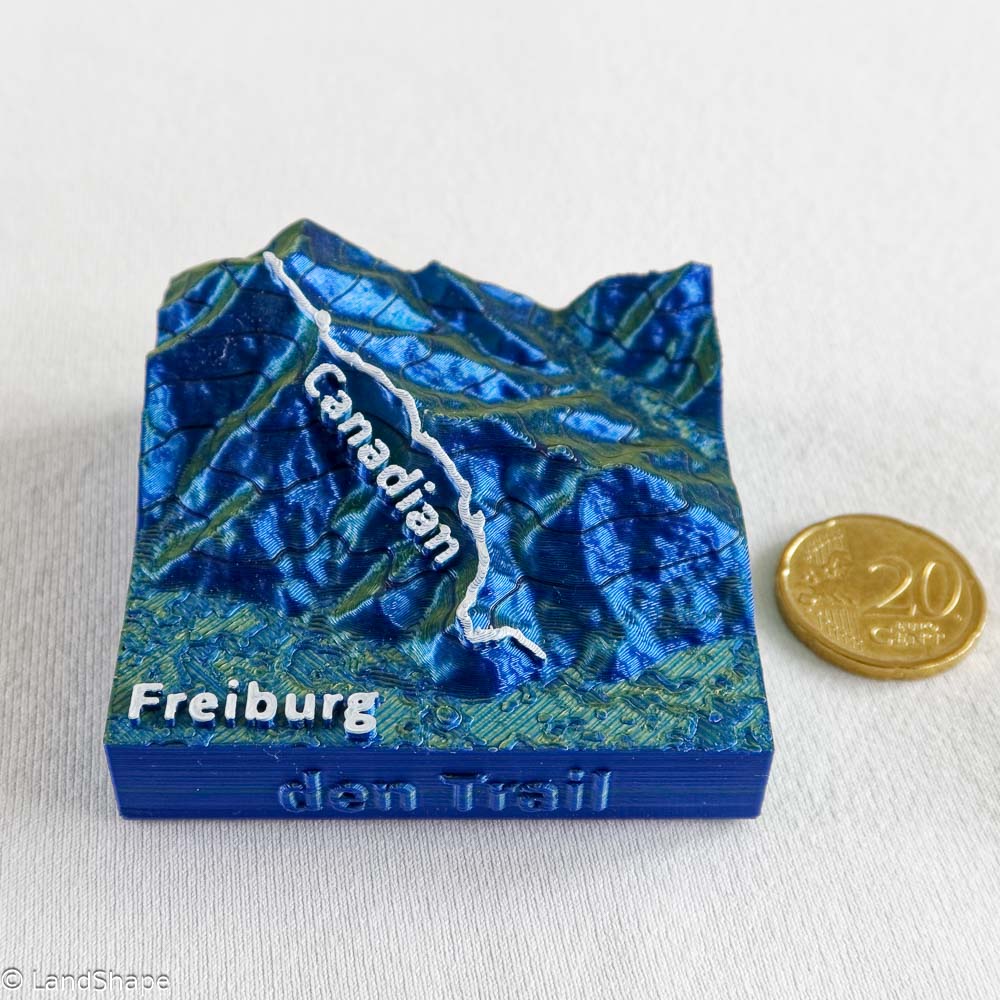 Produktfoto des Canadian-Trail Dekomagneten in Metallic Blue mit 20 Cent Münze