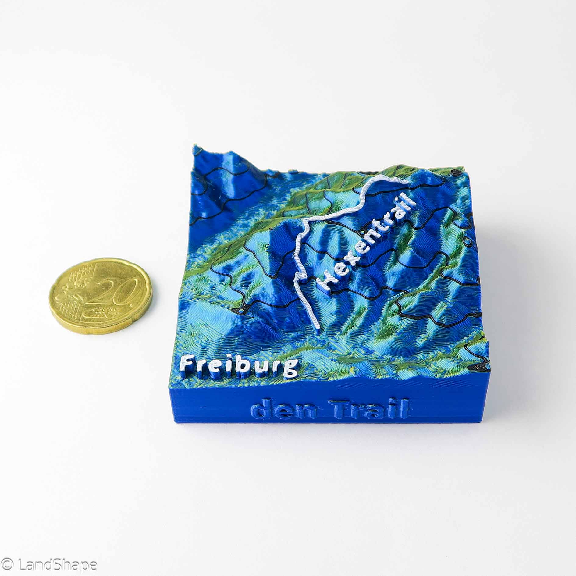 Produktfoto des Hexentrail Dekomagneten in Metallic Blue mit 20 Cent Münze